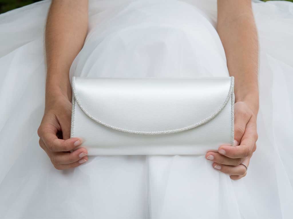 Viki Ivory Satin Bridal Clutch Bag - Being Held